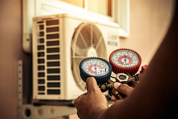 Professional Heat Pump Repair technician working in Montrose, AL